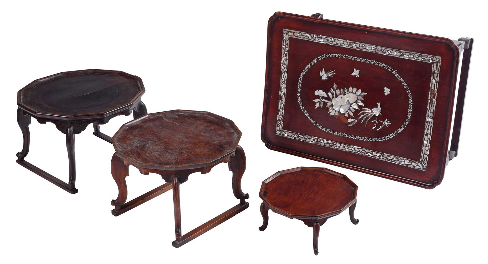 Four Korean Carved Wood Stands: Joseon dynasty, threewith 12 sided top, largest 10-3/4 x 17 in.; anothercollapsible with mother of pearl inlay, 11 x 27 x 20 in. Provenance: Collection from a West Point Graduate who lived in Korea in