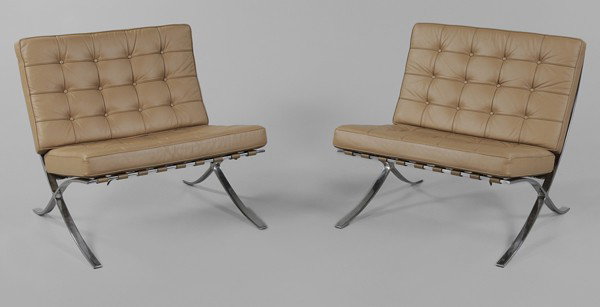 Pair Barcelona Chairs: after a design by Mies van der Rohe, modern, chromed frames and buttoned leather cushions, 29-1/4 x 30 x 30 in., excellent condition, light surface wear Provenance: Collection of the late Reynolds Pri