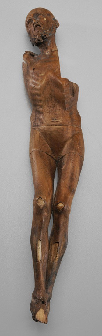 Continental School: "(possibly 17th century) Unusual Reliquary [Corpus Christi,] carved wood inset with bone, 11-1/4 in., losses to foot, bone inlay, arms and chest, traces of original polychrome surface Provenance: Coll