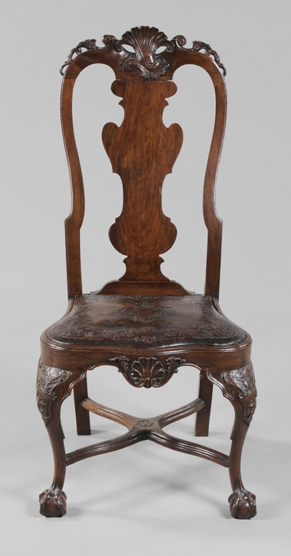 Continental Baroque Carved Walnut Side: "Chair Portuguese, Dutch or possibly Colonial, 18th century, pierce-carved crest, original slip seat with probably original tooled leather upholstery, seat frame with through-tenon construction, 44-1/