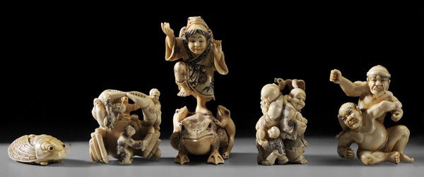 Five Japanese Style Netsukes: Chinese, 20th century, carved and inked ivory: cicada, gods of longevity and good luck, sumo wrestler, man dancing with toads, crab, all art signed, 1-1/2 in. to 2-3/4 in., good condition Provenance: 
