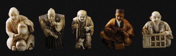 Five Japanese Style Netsukes: Chinese, 20th century, figural genre scenes, inked and stained ivory, all signed: Daruma doll maker, man with gourd and liquor glass, watchman with lantern and dog, sumo wrestling judge, seated woodwo
