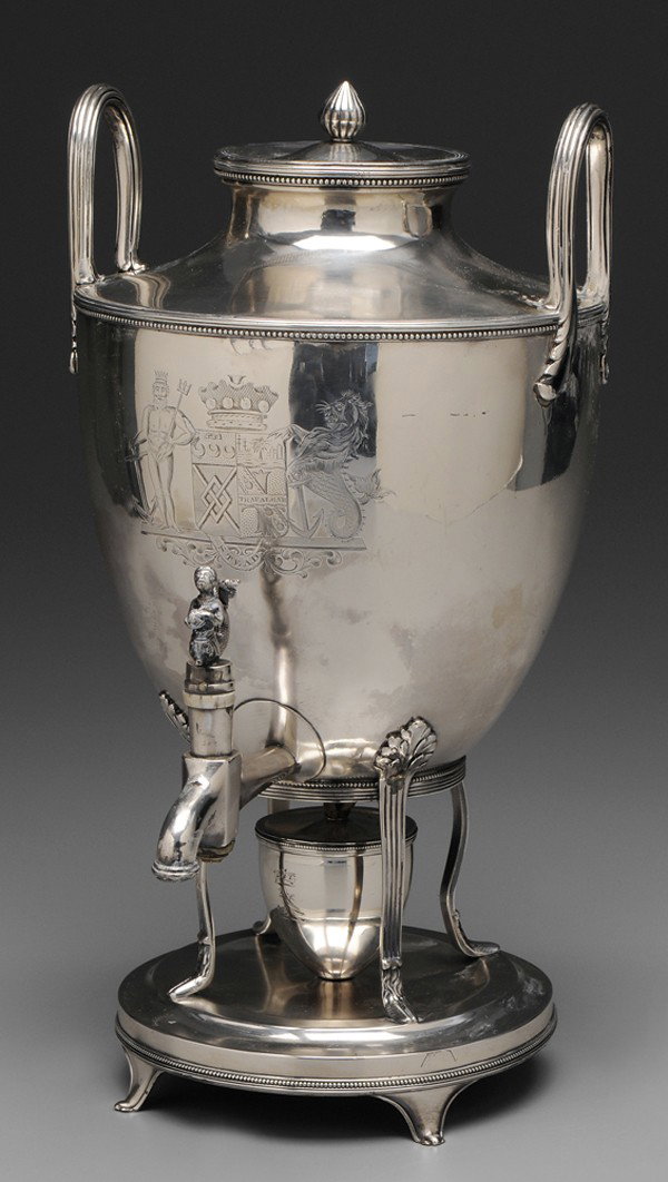 George III Silver Water Urn: London, 1791, reed and acanthus handles, mermaid spout finial, marks for Peter Podio, heraldic device assosciated with family of Admiral Lord Nelson (1758-1805), .925 fine, 87.70 oz.T., 16 in., old la