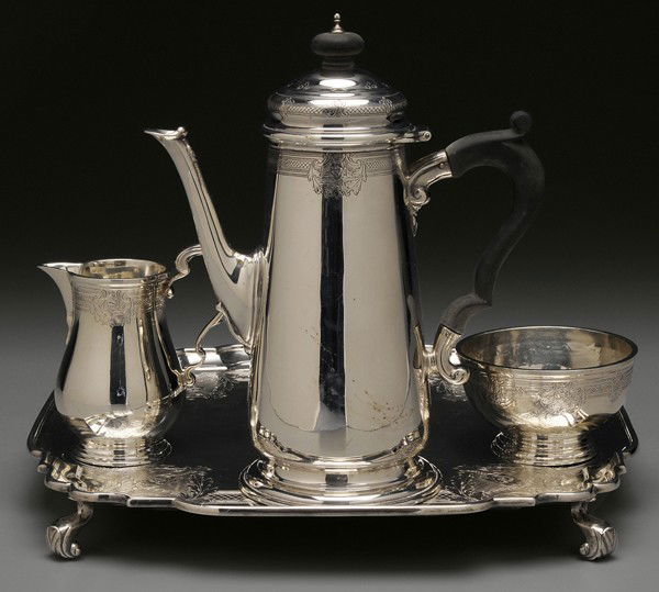 Four-Piece Tiffany English Silver: "Coffee Service London, 1929-1930, engraved band with wreaths and mask, 8-1/4 in. coffeepot, with matching creamer and sugar and 11-3/4 in. tray, marks for Charles Stuart Harris, retailer Tiffany & Co