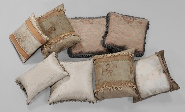 Eight Fine Pillows: two with antique hand-woven tapestry fabric, others damask and silk, tassel edges, all feather or down-filled, two matched pairs,