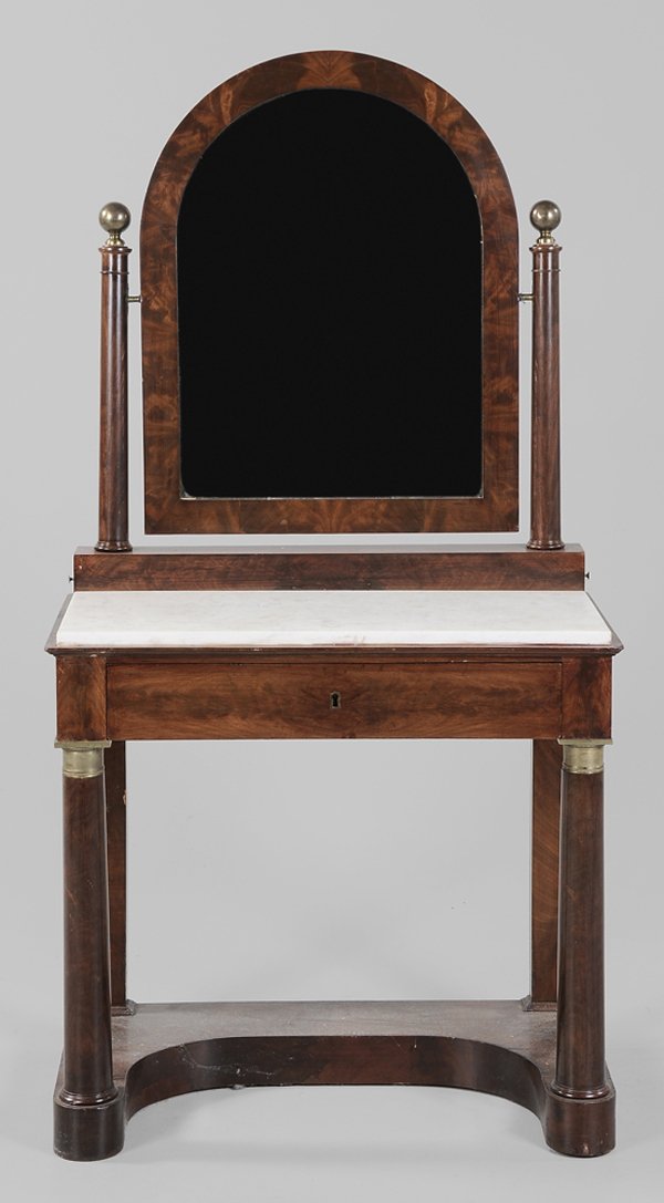 Empire Mahogany Marble-Top Dressing: Table French, 19th century, figured mahogany veneers, white marble top, single drawer with fitted interior and tooled leather-lined writing board, mirror plinth set with two small pen drawers, 62 x 32