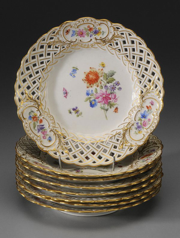 Set of Eight Meissen Dessert Plates: German, 20th century, porcelain with reticulated borders, hand-painted floral bouquets and gilt highlights, blue crossed swords marks under glaze, 8 in.,