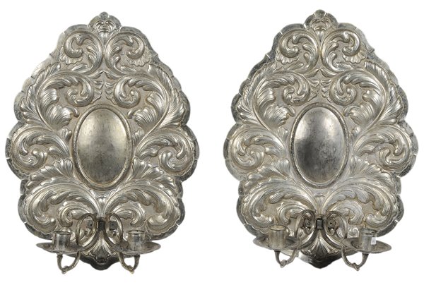 Pair Gilt Metal Sconces: French, late 19th century, hammered brass with gilt surface, each with oval central medallion with broad scrolled border, two scrolled arms and candle sockets, 18 in.,