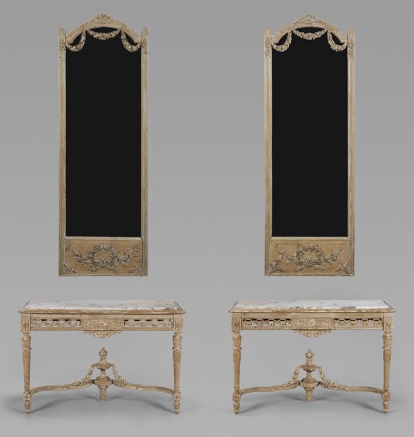 Pair Louis XVI Style Carved and Parcel: Painted Pier Tables With Mirrors British or French, 19th century, each elaborately carved with traces of white paint, mirrors set with floral festoons and ribbon-carved pediments, pegged construction,