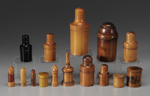Fifteen Treenware Lidded Containers: ebony, fruitwood, beech, maple, one a souvenir from the birthplace of Robert Burns, one lid marked "Schopberg", two lighthouse shape with German marks, most for perfumes and scent bottles, four with o