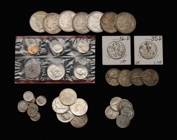 $55.80 Face Value U.S. Silver Coins: includes seven silver dollars, six Morgan (one 1900 AU), one Peace; 36 half dollars 1964 and earlier, six Walking Liberty, 15 Franklin, 15 Kennedy; 89 Washington quarters; 77 dimes, 21 Mercury, 55 Roo