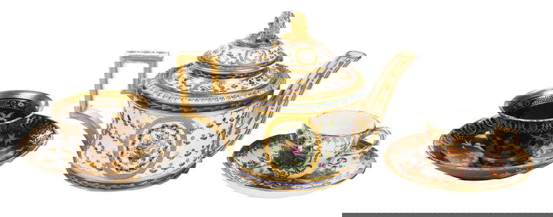 Continental Porcelain Teapot and Two Tea Cups with Saucers, Sevres and Meissen: 18th/19th century, comprising: Sevres tea pot, in enamel and gilt decoration featuring floral sprays, lid in matching design with wreath finial, base marked with interlacing L's and "B/A", 5-1/8 x 7-1
