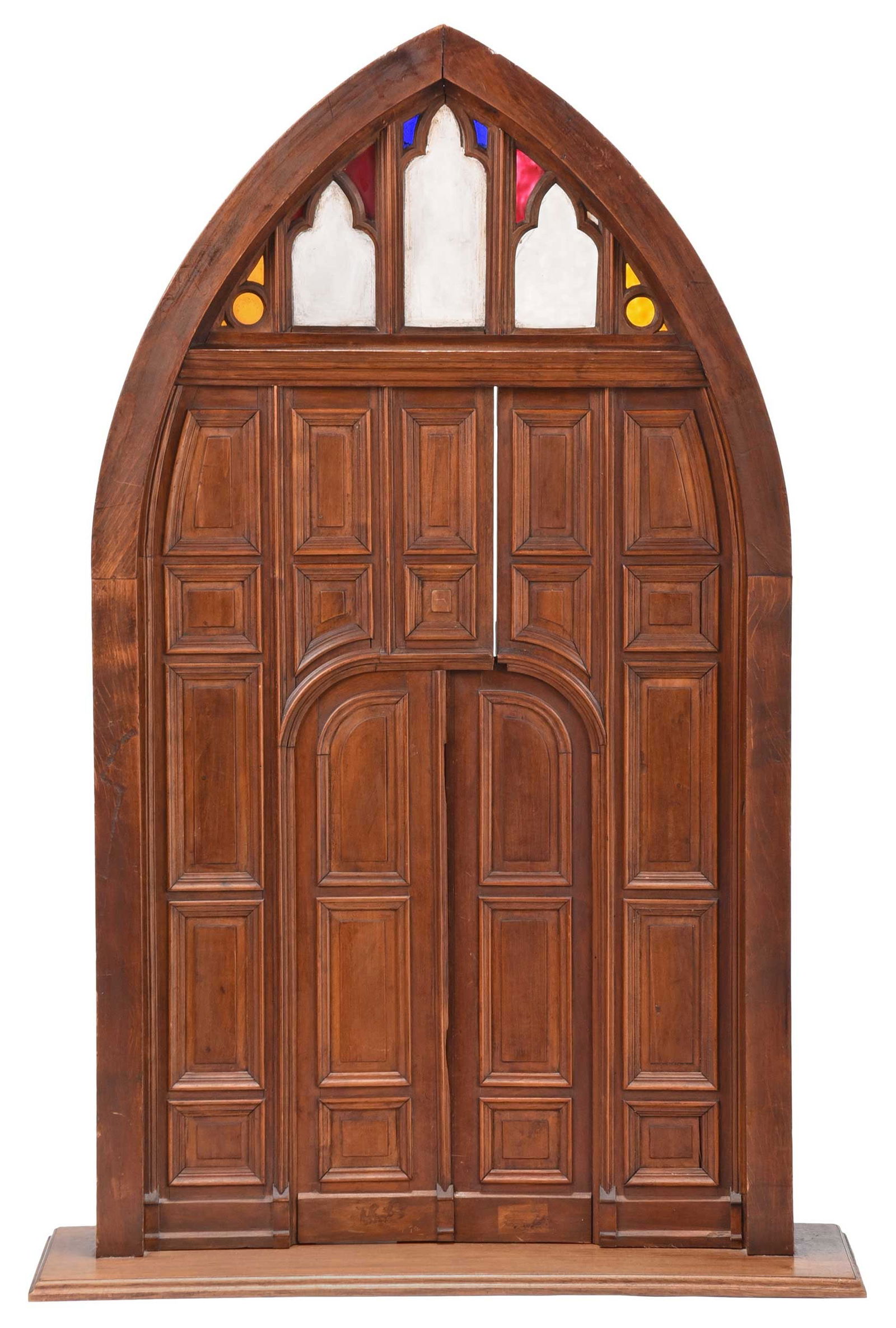 Gothic Style Architectural Model of a Door: Continental, 20th century, arched form with three cutout windows with acrylic inset panels imitating glass panes, hinged doors, on rectangular base, 38-3/4 x 25-1/4 x 7-3/4 in. Provenance: Gary Young,