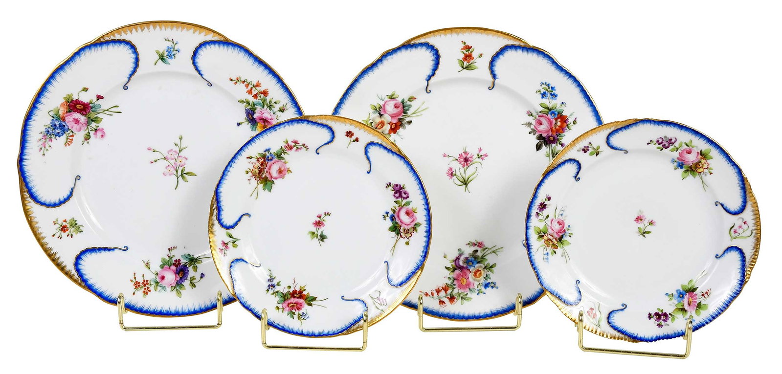 Four Russian Imperial Porcelain Factory Peterhof Service Plates: late 19th/early 20th century, each in enamel and gilt decoration, comprising: two dinner plates, one marked on base with green Imperial cypher mark of Nicholas II dated "1898", the other with green Im