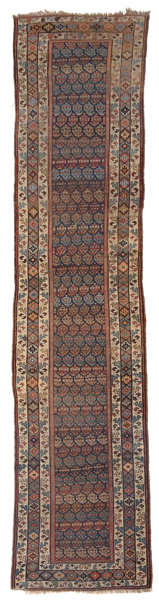 Persian Runner: early 20th century, dark blue field with repeating boteh, borders with geometric hooked elements, 3 ft. 3 in. x 14 ft. 7 in. Provenance: Estate of Donna Summer, Brentwood, Tennessee