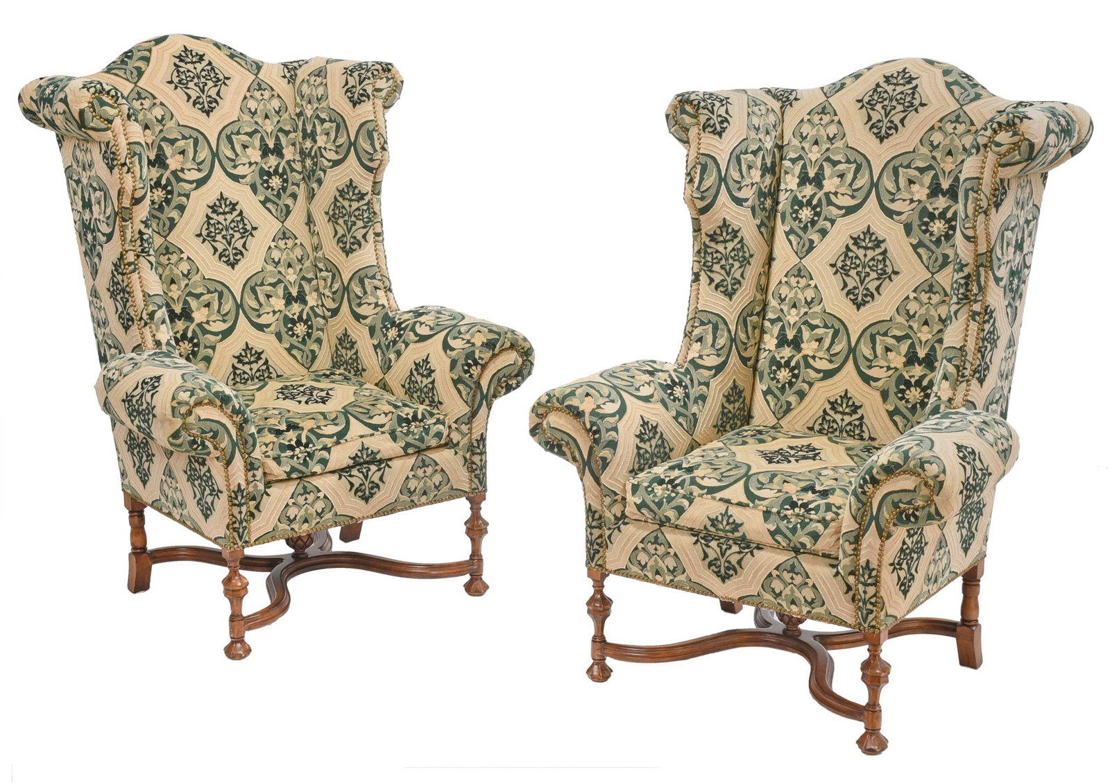 Pair of Louis XIII Style Upholstered Walnut Fauteuils a Oreilles: arched crest rail, scrolled wings and arms, cut velvet upholstery with brass tack decoration, turned and lobed legs, molded double incurvate stretcher centered by a pine cone finial, 55-1/2 x 42 x 30 