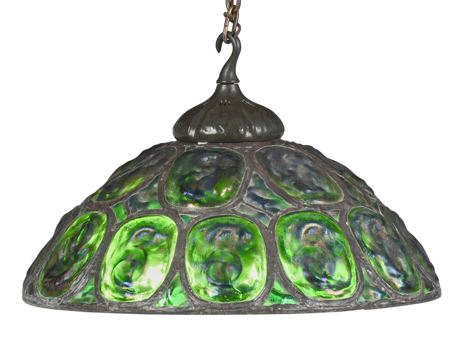 Turtleback Tile Chandelier in the Style of Tiffany: circa 1980s, domed leaded glass shade comprising twenty iridescent green oval turtle-back tiles, stamped "Tiffany Studios/New York" on interior rim, shade 9 x 24 in.; support with six sockets, openwor