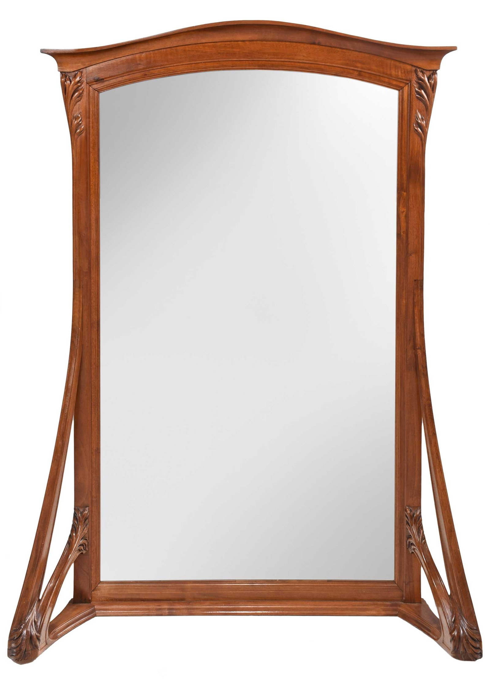 French Art Nouveau Carved Walnut Cheval Mirror: circa 1900, manner of Louis Majorelle, serpentine arched cornice, conforming surround decorated with foliate sprays, beveled mirror plate, stylized bracket supports, 63-3/4 x 45 x 12 in. Provenance: C