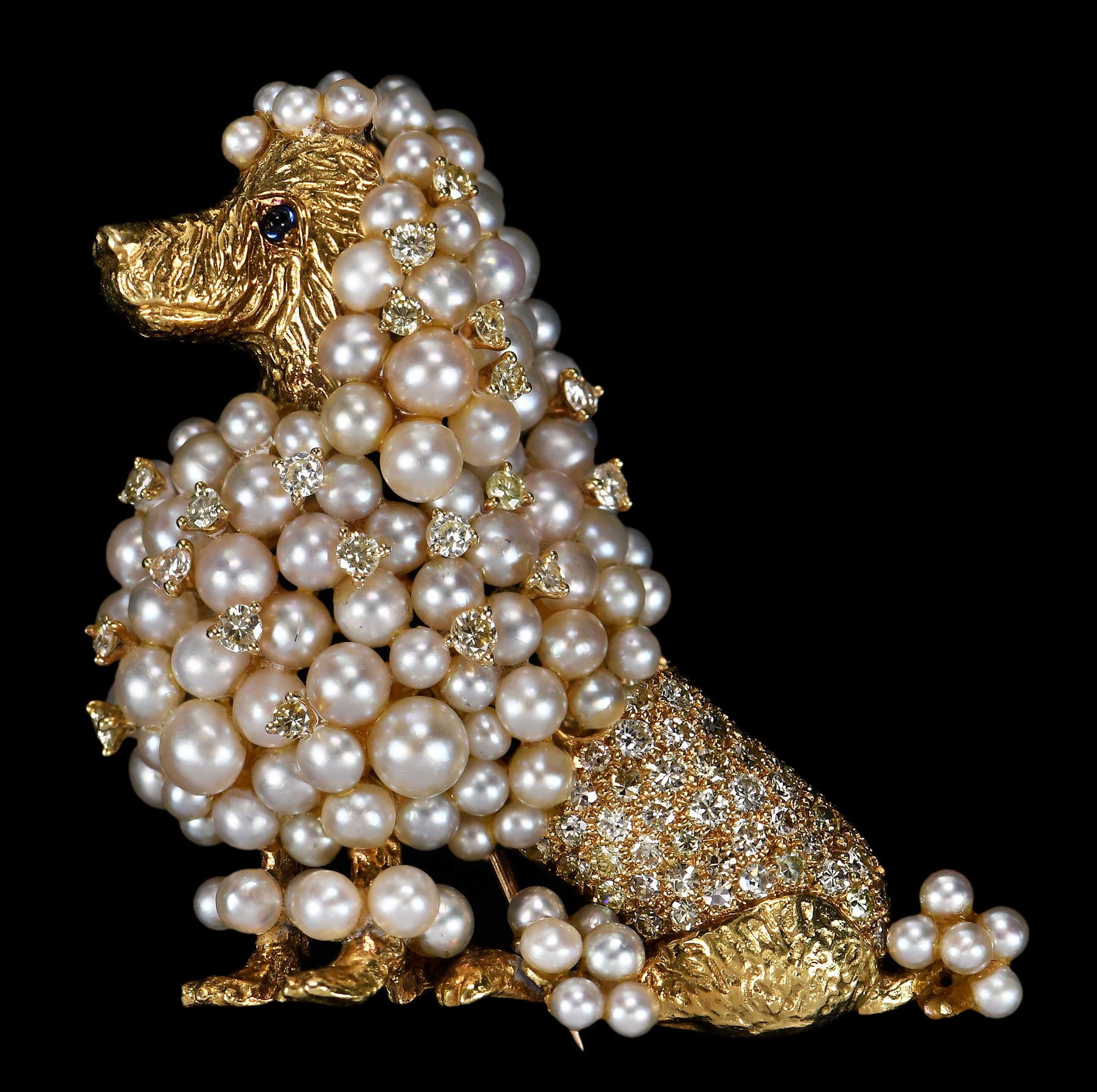 18kt. Poodle Pearl and Diamond Brooch, by Julius Cohen: 53 round full brilliant cut diamonds, approx. 1.8 - 2.5mm, 14 round single cut diamonds, approx. 2.25 - 2.5mm, all diamonds are greenish yellow, fancy yellow, and white in color, SI, 99 pearls ranging