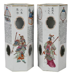 Pair of Chinese Porcelain Hat Stands: with labels reading Daoguang period, of hexagonal form, finely enameled, depicting six demi gods or immortals, auspicious symbols, mask form decoration, porcelain vase, and dragon, gilt highlights, 11