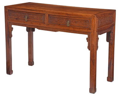 Chinese Carved Huanghuali Console Table: 19th century, plank top, relief carved decoration, two frieze drawers, carved apron, hoof feet, painted with accession number 99.186, 33 x 47-1/2 x 19-3/4 in. Provenance: Price and Elaine Rogers Colle