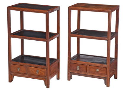 Pair of Chinese Huanghuali Diminutive Etageres: 19th century, inset top and shelves, base fitted with two small drawers, shaped skirt, 23-3/4 x 13-3/4 x 8-3/4 in. Provenance: Price and Elaine Rogers Collection, now property of the Virginia Museum