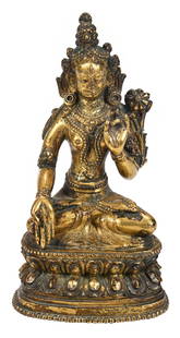 Gilt Bronze Tibetan Seated White Tara Figure: possibly 18th century, gilt bronze figure of White Tara seated in padmasana on triangular lotus base with hands raised in mudras, 6 x 3-1/2 x 2-1/2 in.Provenance: Collection of Max Loehr, Abby