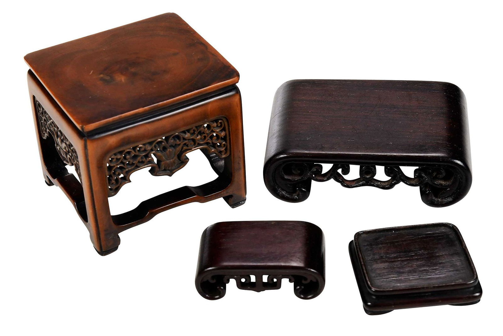 Group Of Four Chinese Carved Wood Stands Auction