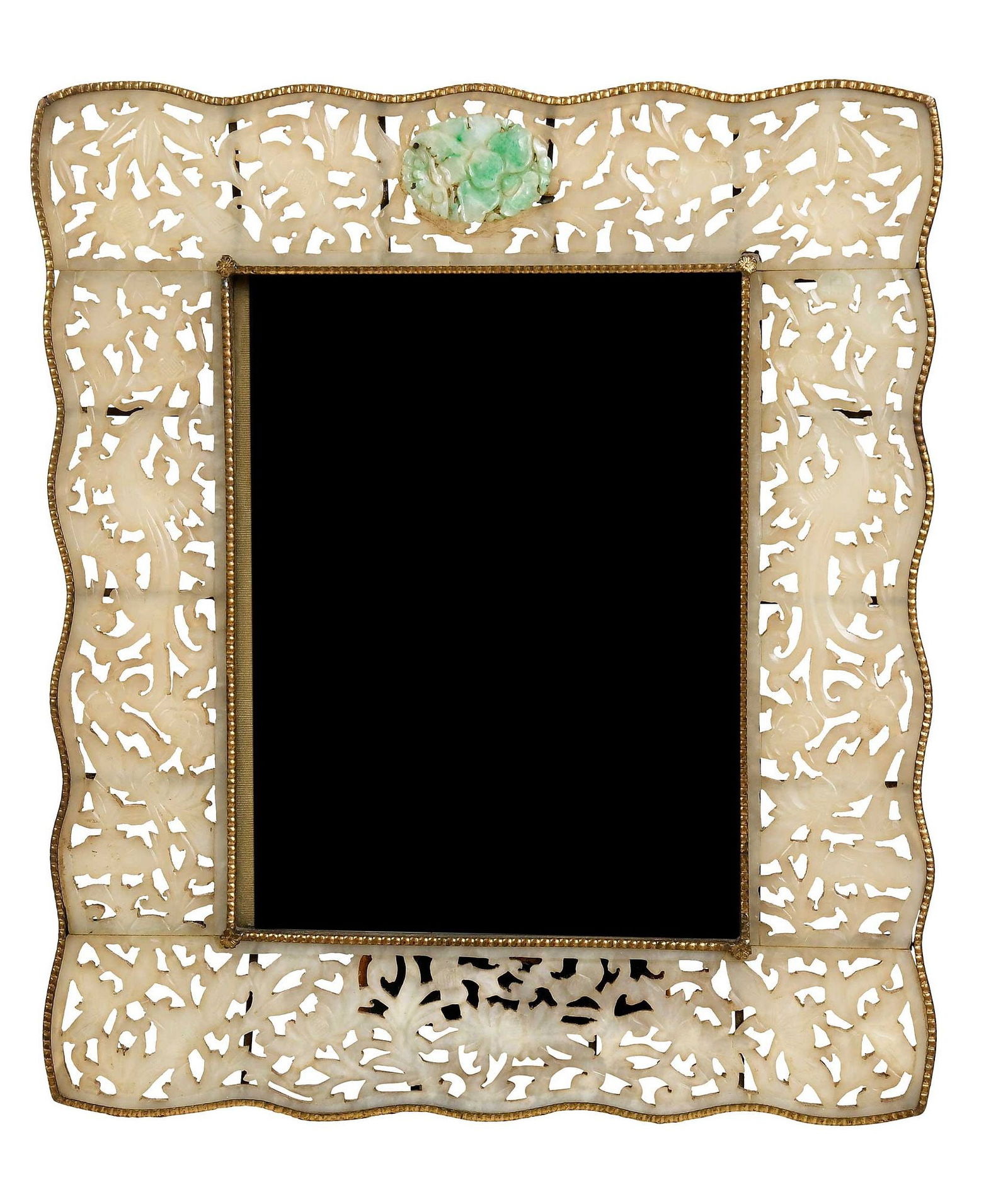 Chinese Carved Jade Photo Frame: carved whitish nephrite in vine pattern, with metal mounts and velvet kickstand, with oval green and whitish jadeite applique on top center, 11-3/8 x 10 in. Provenance: Alice L. Patrick, Charleston, S