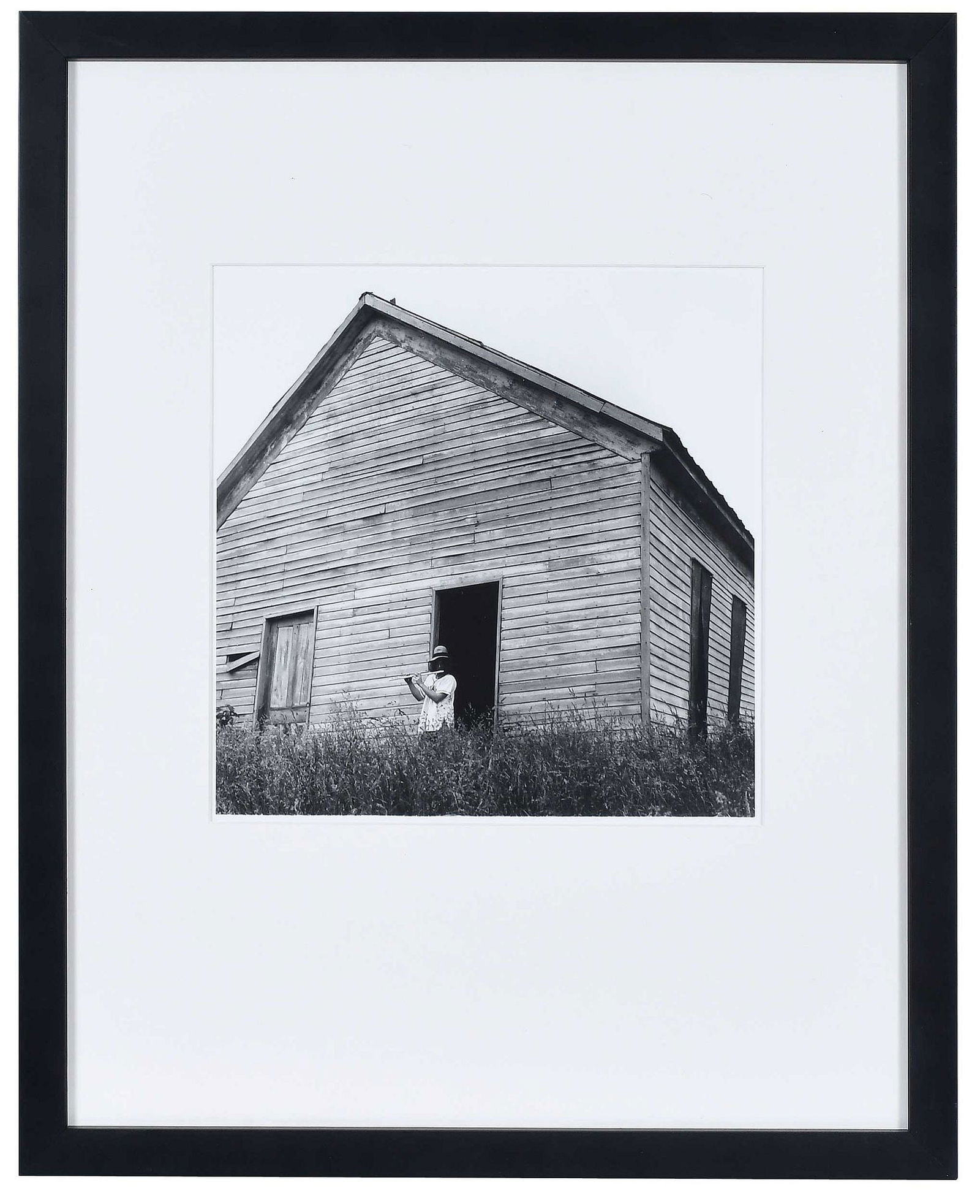 Ralph Eugene Meatyard: (American, 1925-1972) Girl Playing Flute in Doorway, 1977, estate print, stamped print verso "One of two prints made from original negatives. Printed in December of 1977 for Madelyn Meatyard by John D