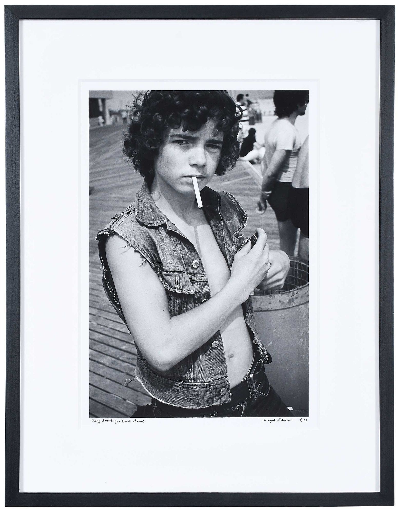 Joseph Szabo: (American, born 1944) Gary (Charlie) Smoking, Jones Beach, 1976, signed, titled, and editioned 4/25 in ink recto; signed, titled, dated, and editioned with annotations in pencil verso, silver gelatin