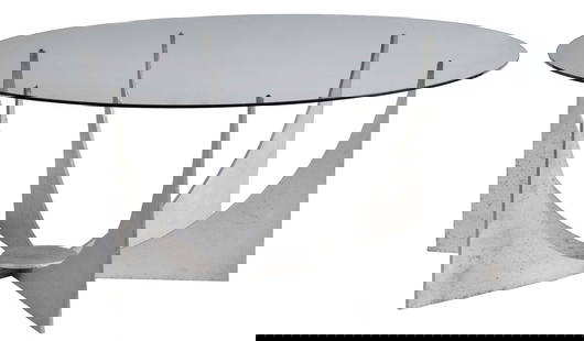 Mid Century Modern Cast Aluminum and Glass Coffee Table: possibly Donald Drumm or after, later round glass top, modernist bracketed base, 15-1/2 x 38-1/2 in. Provenance: Private Collection
