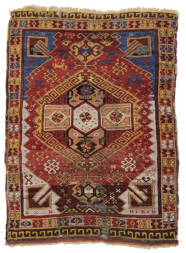 Turkish Rug: early 20th century, 4 ft. 3 in. x 5 ft. 9 in., pile varies from none to low, extensive corroded areas lacking pile, bleeding, end and fringe loss (2 in. at one end), scattered pest damage, extensive l