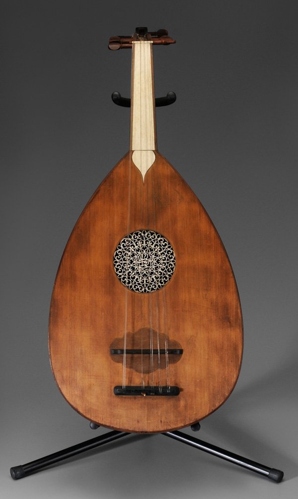Carved Wood and Bone Lute or [El Oud]: Middle Eastern, possibly Syria, late 19th century, bone-inset neck and reticulated bone rosette soundhole with carved Arabic script, interior set with label with Arabic script and "Sahate" and "Jizere