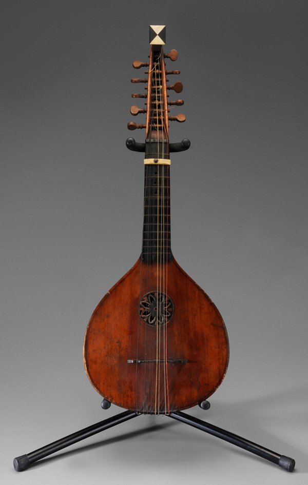 British Baroque Gittern: neck marked "Preston Maker London", second half 18th century, pierced rosette soundhole, bone and ebony(?) inset neck, 28-3/4 x 11 in., scattered cracks and warping especially to back, repairs to rose