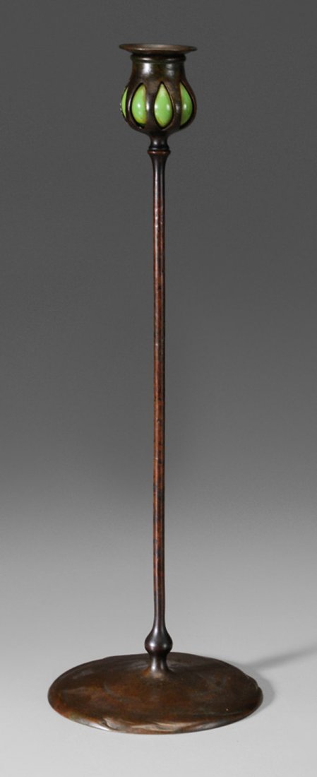 Tiffany & Co. Bronze Candlestick: American, late 19th/early 20th century, base stamped "Tiffany Studios New York 30054", patinated bronze, removable green candle cup with bobeche insert, lightly swirled base, 17-1/2 in., repairs to gr