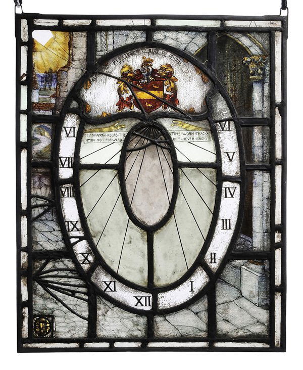 Leaded Stained Glass Window: British or American, circa 1900, in the form of a sundial with inscription "My shadow keeps the time worn track moving forward but never back", monogram signature lower left "OTP"(?), 23 x 17-3/4 in.,