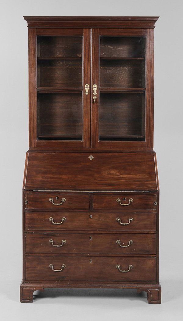 Georgian Figured Mahogany Secretary/: Bookcase British, 18th century in part, bookcase top with adjustable shelves, fitted desk interior, dovetailed drawers, original bracket feet, 85-3/4 x 41-1/2 x 21-1/2 in., upper case a marriage and l