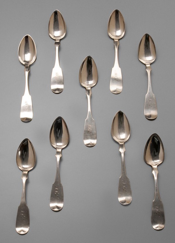 Nine Kentucky Coin Silver Spoons: American, 19th century, upturned tipt front shaped fiddle handle, pointed fins, marks for William Kendrick (Louisville, Kentucky, working 1831-1880), monogram, 8.09 oz.T., 7 in., good condition, one w