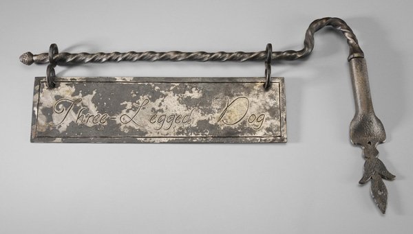 Samuel Yellin Sign Holder: wrought iron, twisted holder with pocket style mounting socket, strawberry and floral style finial, 13 x 20-3/4 in.; sign stamped "SAMUEL YELLIN" and marked in script "Three-Legged Dog", 14 x 4 in. no
