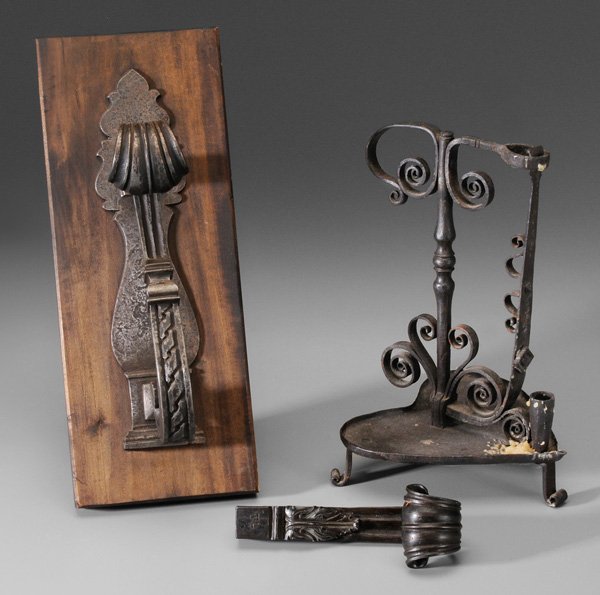 Three Works by Tom Latané: finely detailed rush candle stand, heart-shaped with tripod scrolled feet, marked on base "Latane", 11-1/2 in., [scattered light rust and wax residue;] door knocker, finely detailed and scrolled on ca