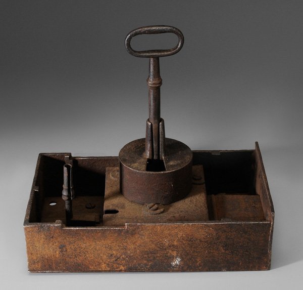 Monumental Iron Double Lock and Key: British or American, 19th century, 7-3/4 x 13 x 4 in. excluding 10 in. key, 24 pounds, excellent working order Provenance: Said to have come from a jail; Collection of Tim Kris, Brasstown, North Carol