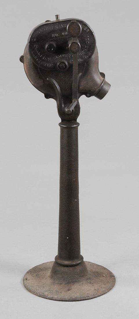 Lancaster Forge Blower: marked on gear box "Lancaster Geared Blower/Champion Blower & Forge Co. Lancaster, Pa. USA", 52 in., good working order, scattered light rust Provenance: Collection of Tim Kris, Brasstown, North Carol