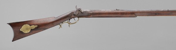 Percussion Long Rifle: attributed to West Virginia or Kentucky, full walnut stock and brass mounts, .54 cal., 44 in. octagonal barrel, brass patchbox; no permit required, old refinishing, trigger guard repaired, patches, re