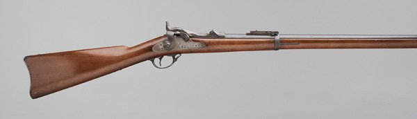 Model 1884 U.S. Springfield Trapdoor: Rifle 32-5/8 in. barrel, .45-.70 cal., marked on lockplate to right of eagle "US Springfield", breech block marked "US Model 1884", serial number 416934, Buffington rear sight; no permit required, sto