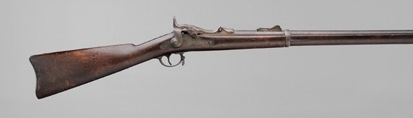 Model 1873 U.S. Springfield Trapdoor: Rifle .45-.70 cal., serial number 219048, 32-5/8 in. barrel with proof marks, lockplate marked "US Springfield" to right of eagle, breech block marked "US/Model/1873", correct sight, stock with faint 