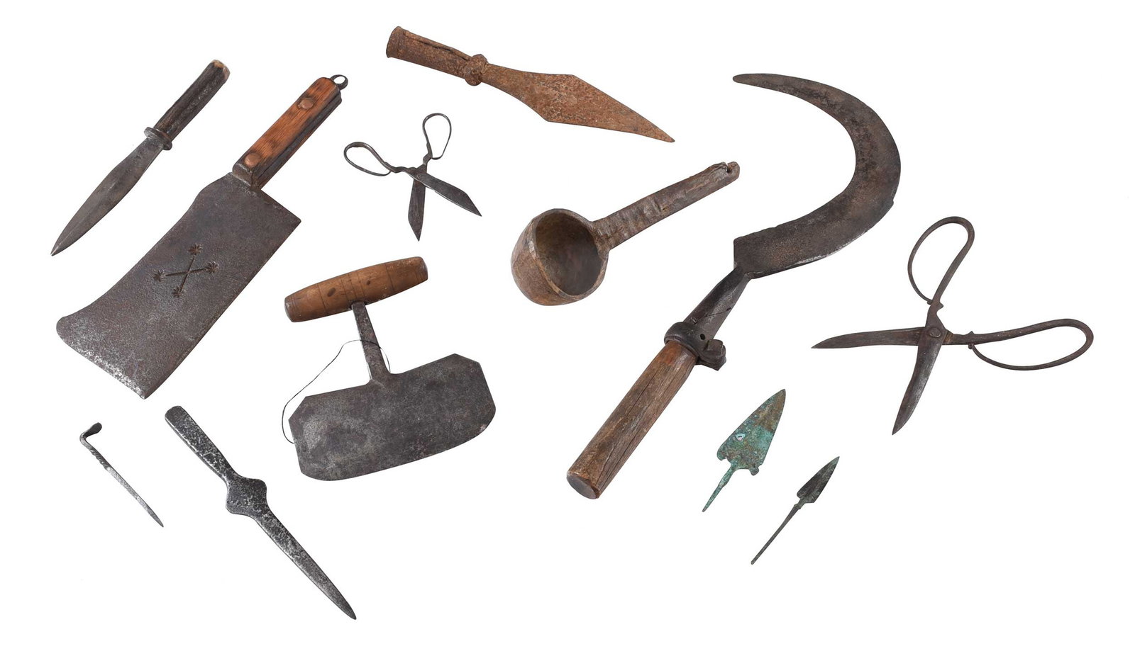 12 Assorted Bronze and Iron Utensils: 18th/19th century, comprising: wood ladle, 10-1/2 x 3-3/8 in.; three knives with wood handles, largest 20-3/4 x 8-1/2 in.; two pairs of iron scissors, larger 10 x 4 in.; knife with bone handle, 10-1/4