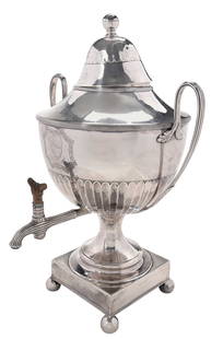 George III English Silver Hot Water Urn, Andrew Fogelberg & Stephen Gilbert: London, 1790, urn form with reeded handles, dome top with removal venting finial, removelable interior hotbox, spout with wooden finial, ball feet on square base, heraldic device on body and elephant