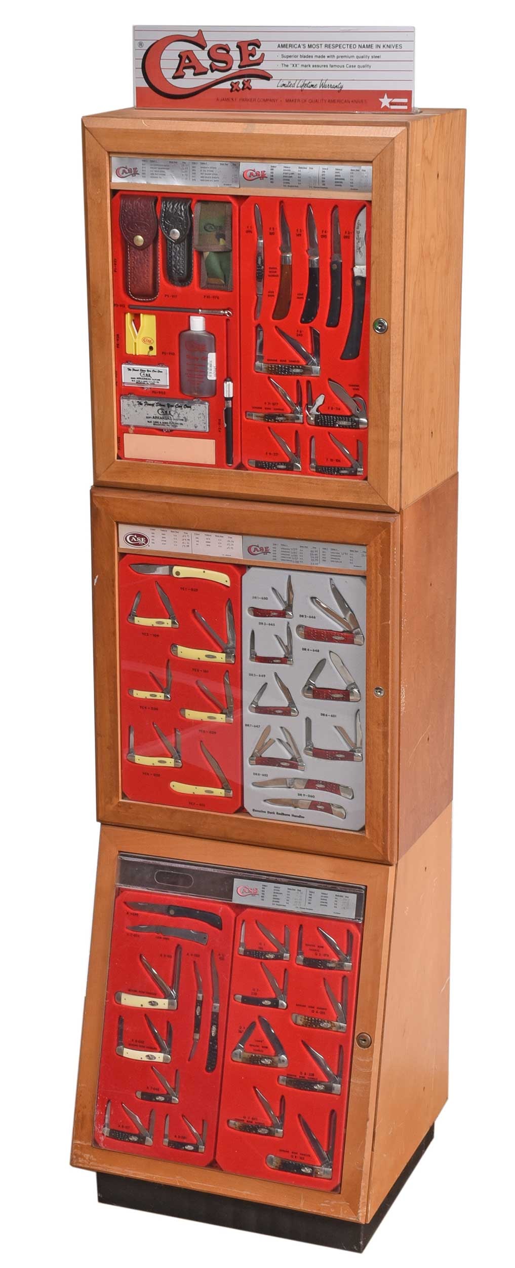 Modular Case Knife Display with 43 Knives and Additional Tools: late 1970s/early 1980s floor display containing 43 total knives with popular models to include: canoe, sod buster, sod buster junior, among other pocket knives, with various handles in bone, dark redb
