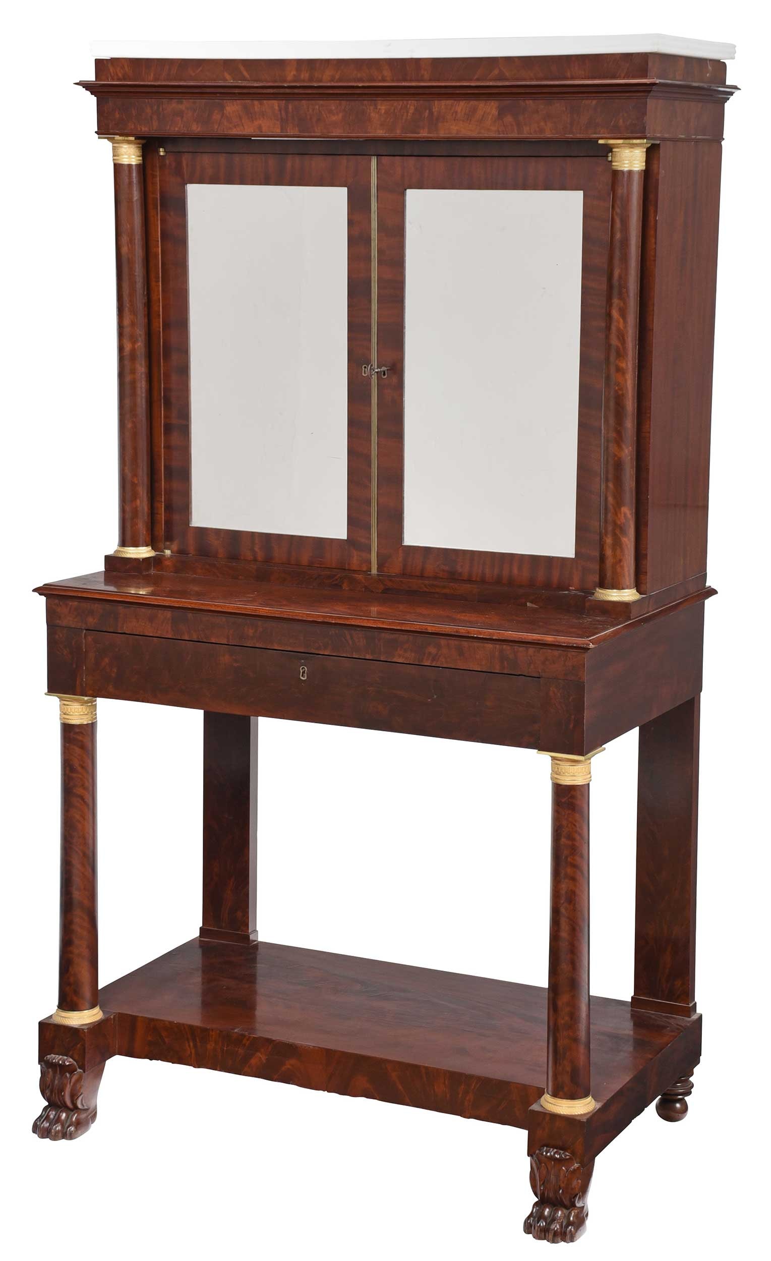 American Classical Bronze Mounted Mahogany and Marble Top Secretary Bookcase: circa 1820-1825, attributed to Duncan Phyfe, New York, associated reeded marble top over a floating plinth and stepped cornice, columnar supports with floral molded gilt bronze capitals, mirrored door